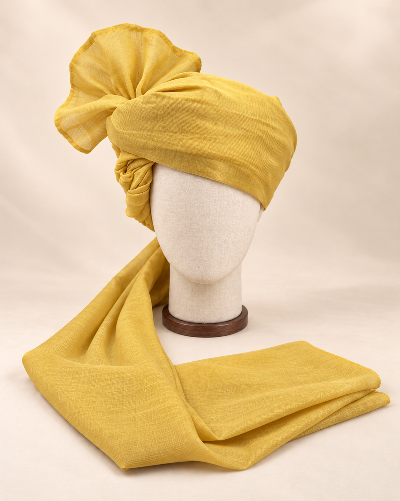 Front view of mustard yellow premium Barati Safa showing the plain woven wrap and broad fan