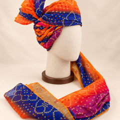 Right side view of orange royal blue multicolour bandhani Barati Safa showing twisted folds and fan