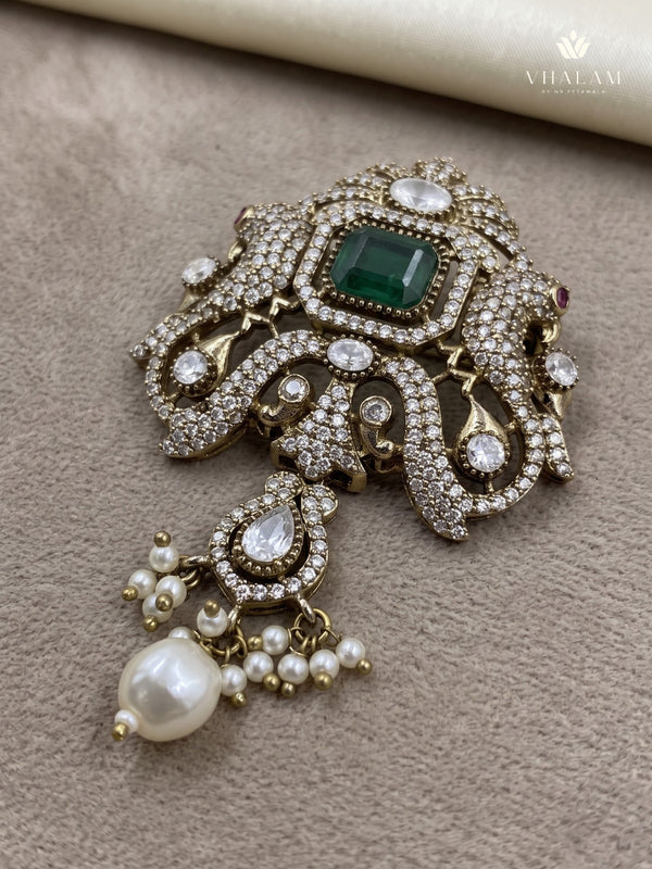 Green Ornamental Brooch with White Bead Drop, front view