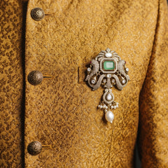 Pastel Green Ornamental Brooch with White Bead Drop, styled view