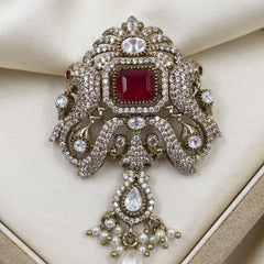 Red Ornamental Brooch with White Bead Drop, front view