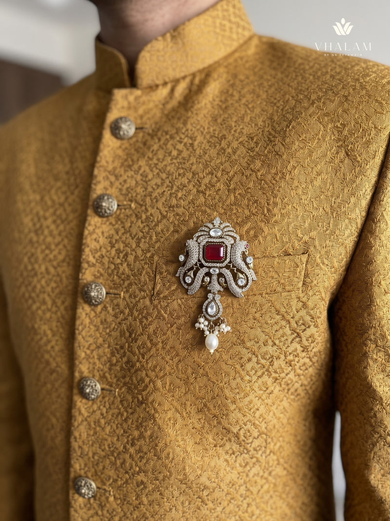 Red Ornamental Brooch with White Bead Drop, styled view