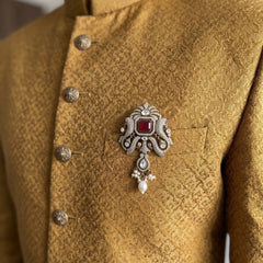 Red Ornamental Brooch with White Bead Drop, styled view