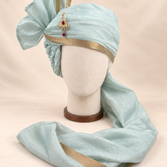 Front view of pale sage gold border premium barati safa showing the gold-tone border and broad fan
