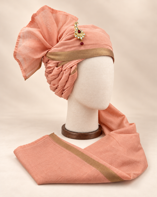Right side view of peach gold border premium Barati Safa showing the twisted folds and fan detail