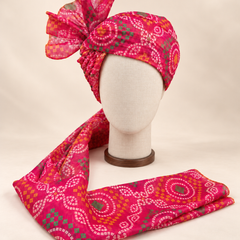 Front view of pink multicolour bandhani Barati Safa with white motifs and green and yellow accents