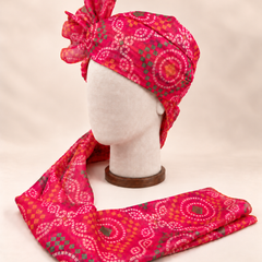 Left side view of pink multicolour bandhani Barati Safa showing the smooth wrap and patterned tail
