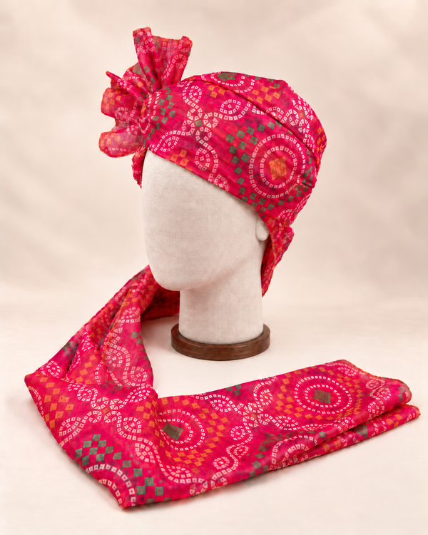 Left side view of pink multicolour bandhani Barati Safa showing the smooth wrap and patterned tail