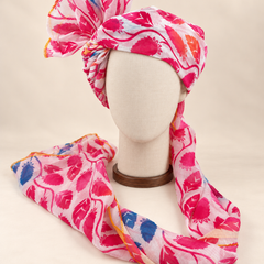 Front view of pink white leaf print Barati Safa with magenta leaves and blue and orange accents