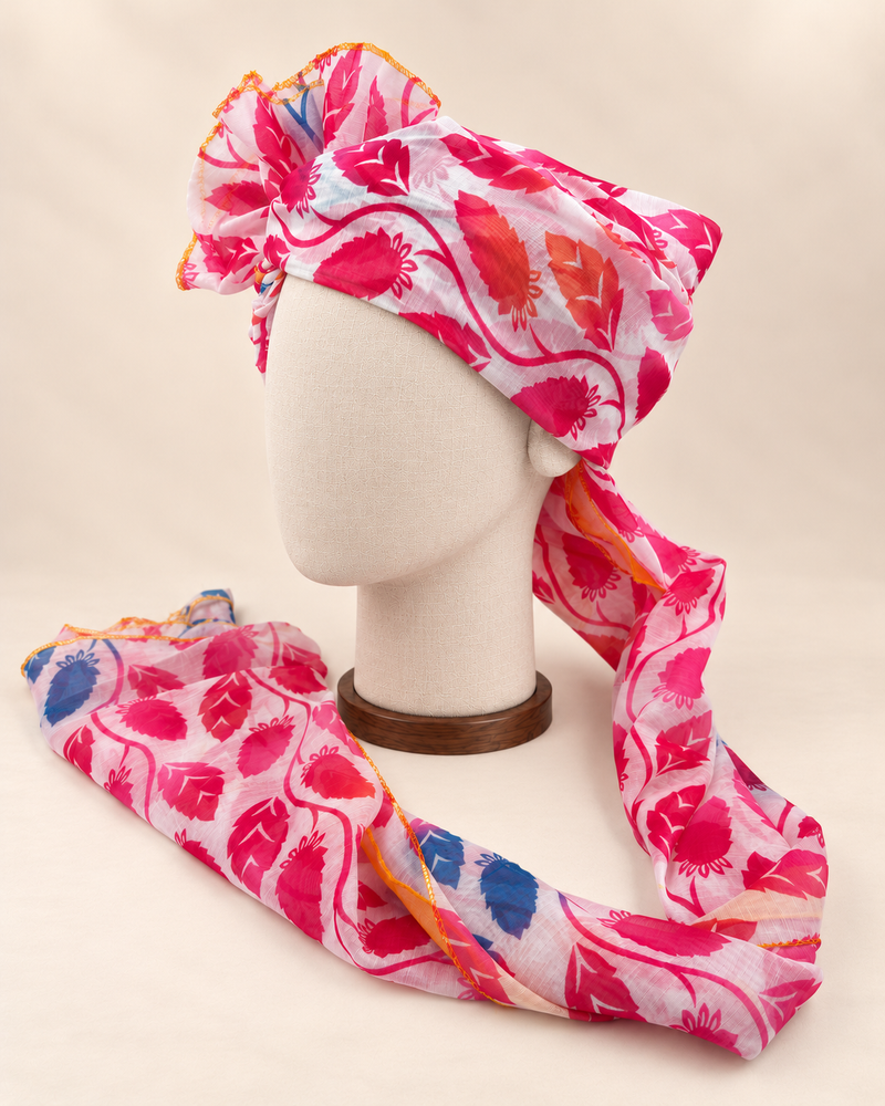 Left side view of pink white leaf print Barati Safa showing the smooth wrap and patterned tail