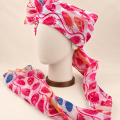 Left side view of pink white leaf print Barati Safa showing the smooth wrap and patterned tail
