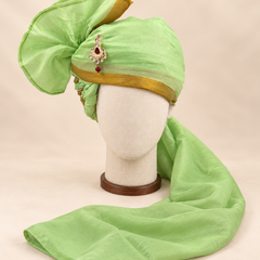 Front view of pistachio green gold border premium barati safa showing the gold-tone border and broad fan