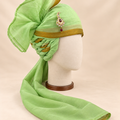 Right side view of pistachio green gold border premium barati safa showing twisted folds and fan detail
