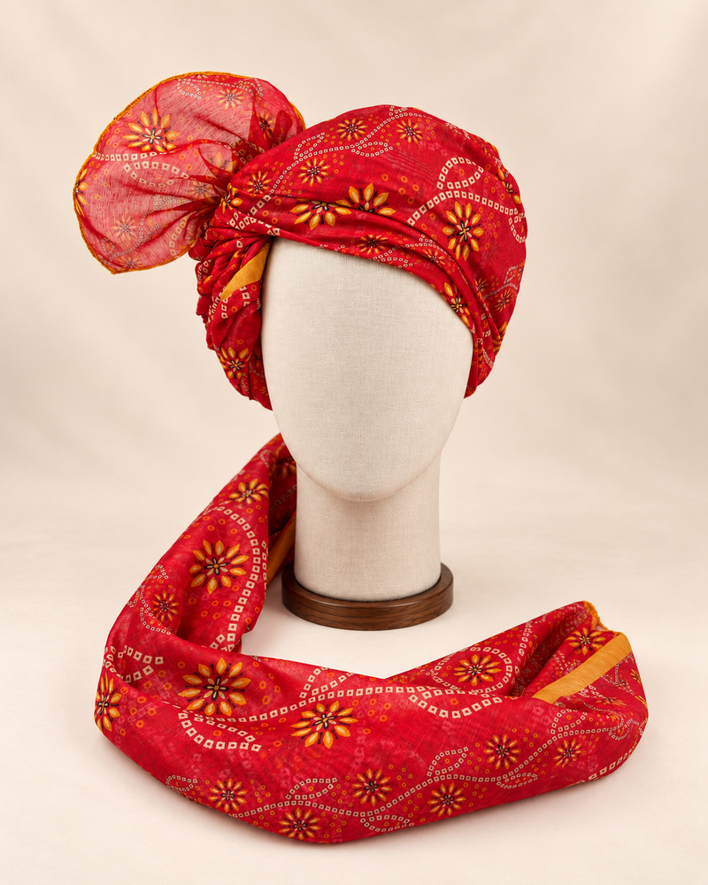 Front view of red floral bandhani Barati Safa with yellow flowers and cream square-dot chains