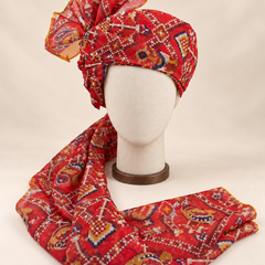 Front view of red multicolour geometric print Barati Safa with cream stepped diamond lattice