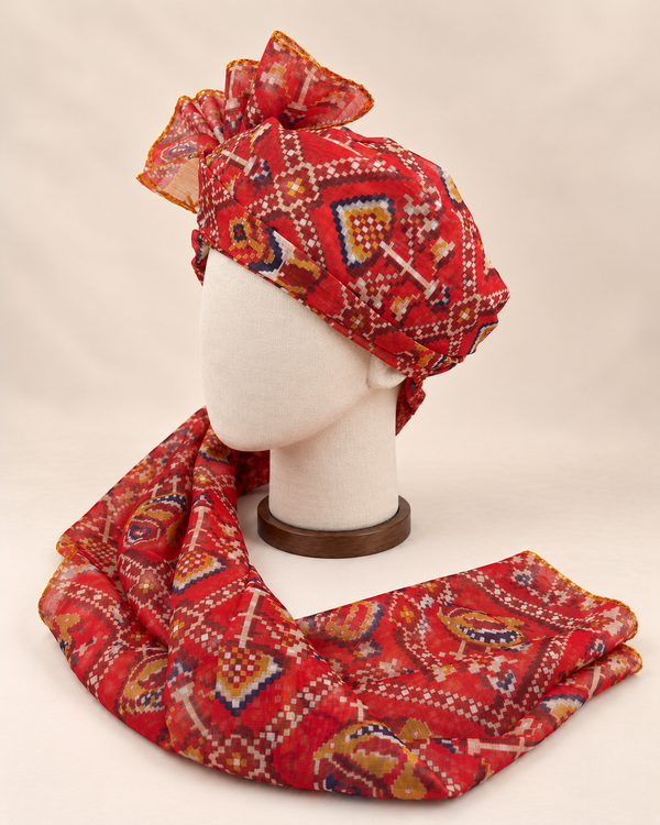 Left side view of red multicolour geometric print Barati Safa with navy mustard and maroon motifs