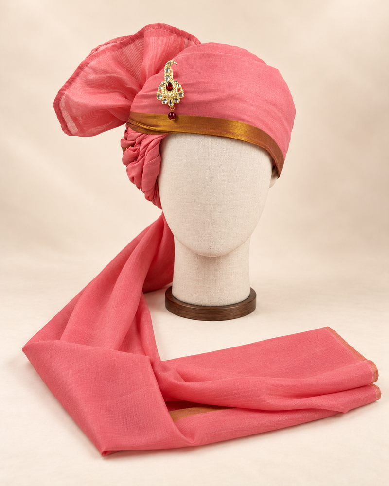 Front view of rose pink gold border premium barati safa showing the gold-tone border and broad fan