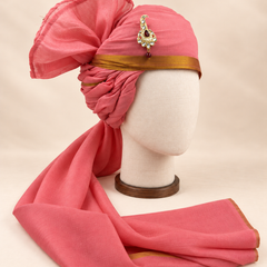 Right side view of rose pink gold border premium barati safa showing the twisted folds and fan detail
