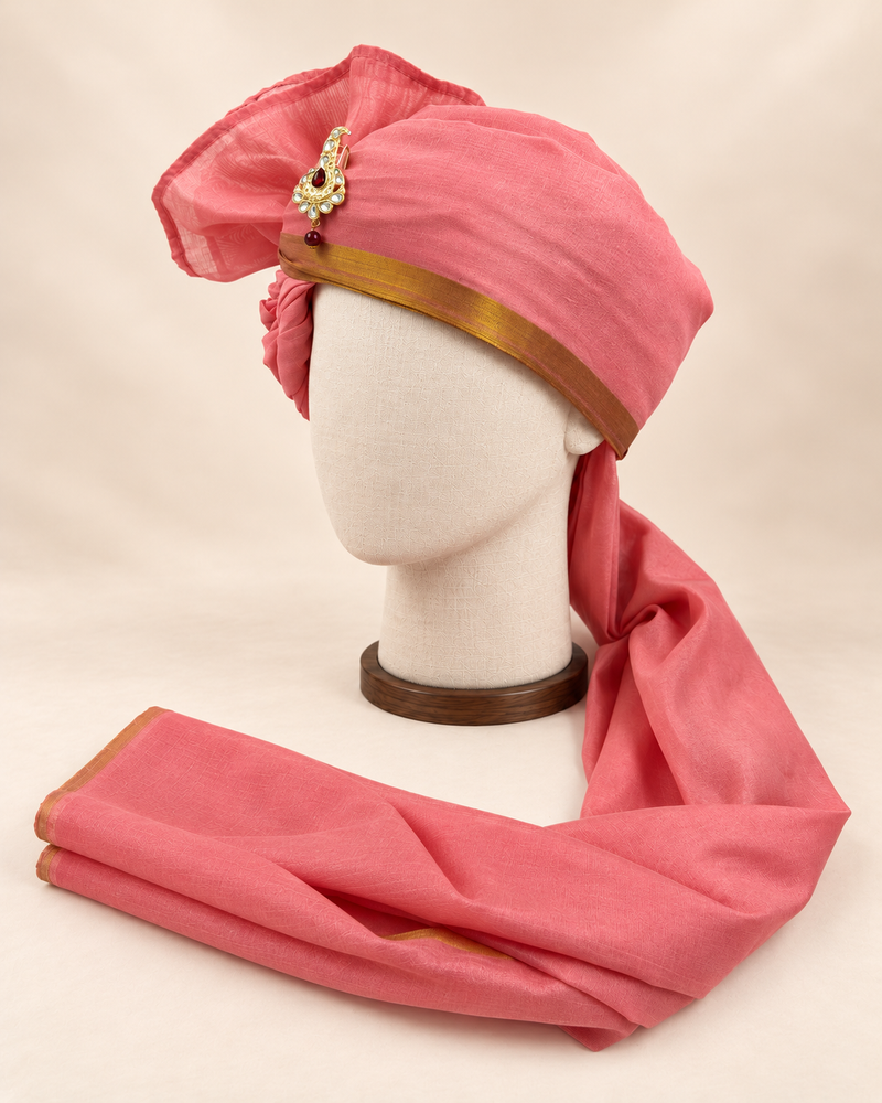 Left side view of rose pink gold border premium barati safa showing the smooth wrap and long bordered tail