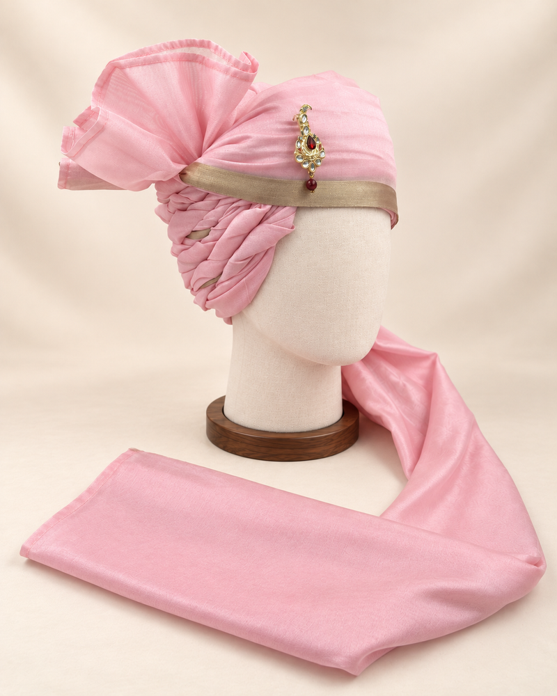 Right side view of soft pink champagne border premium barati safa showing the twisted folds and fan detail