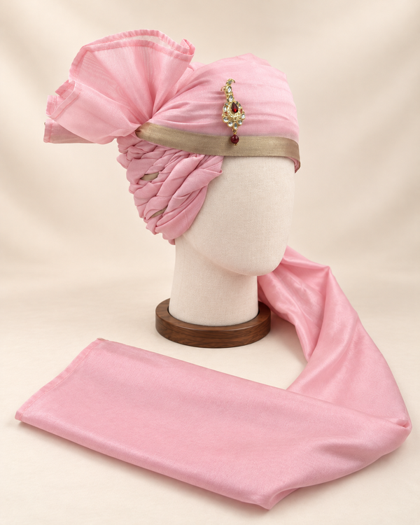 Right side view of soft pink champagne border premium barati safa showing the twisted folds and fan detail