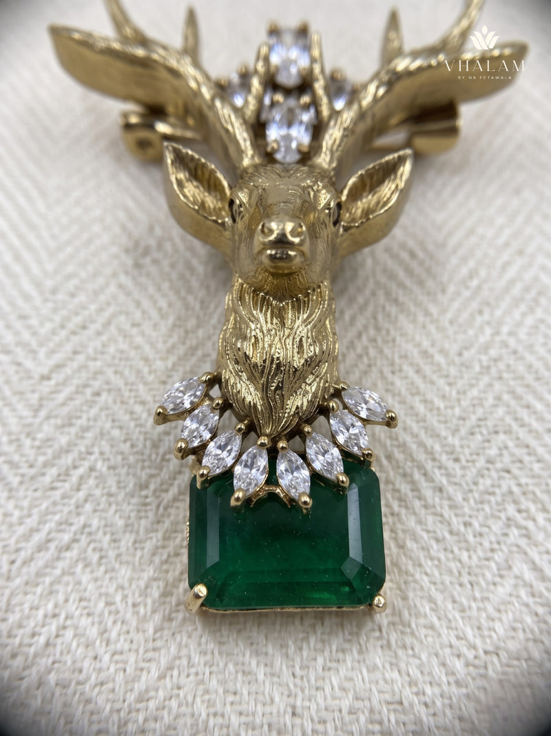 Gold-Tone Stag Head Brooch with Green Accent, detail view