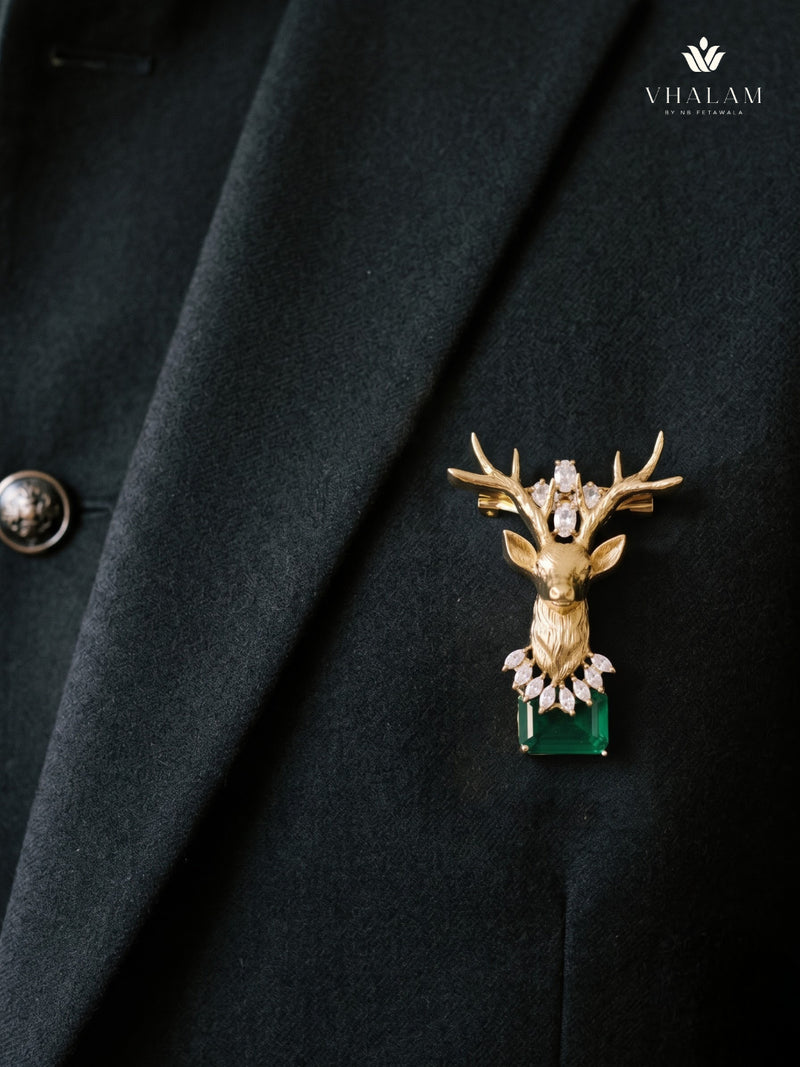 Gold-Tone Stag Head Brooch with Green Accent, styled view