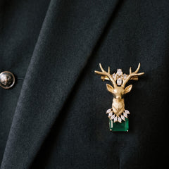 Gold-Tone Stag Head Brooch with Green Accent, styled view