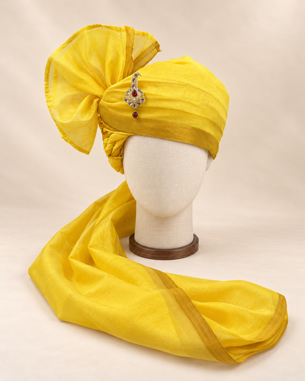 Front view of sunshine yellow gold border premium barati safa showing the gold-tone border and broad fan